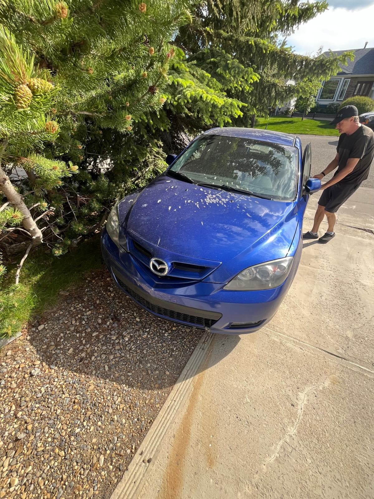 Vehicle pickup example for Junk My Car YYC in a Calgary residential area